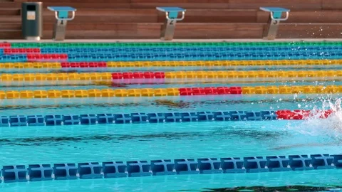 Male Athlete Practicing Freestyle Stroke In The Controlled Swimming Pool Stock Footage 74351624