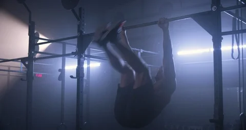 Male athlete training on a pull up bar Stock Footage 104004875