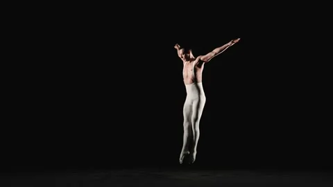 Male ballet dancer performs acrobatic element Stock Footage 151693776