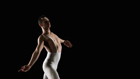 Male ballet dancer performs ballet dance elements Stock Footage 151693802