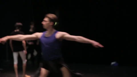 Male ballet dancer is practicing jumps at the daily ballet class Stock Footage 93824205