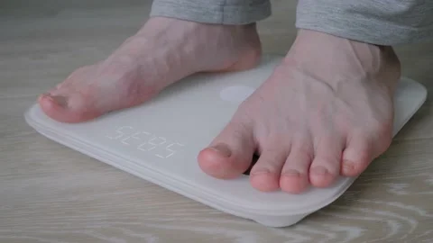 Male bare feet stepping on digital floor... | Stock Video | Pond5