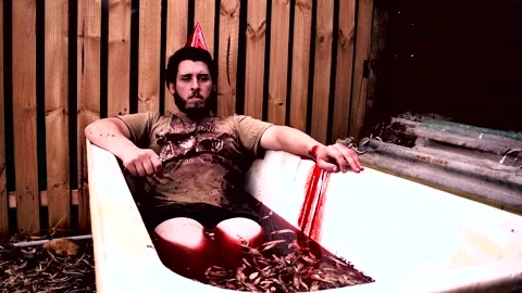 Male bleeding in bathtub Stock Footage 146495834