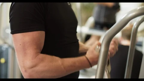 Male Bodybuilder doing Workout Biceps Curl Weight Training in Fitness Studio 스톡 동영상 122402497
