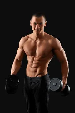 Male bodybuilder posing in studio Stock Photos