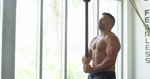 Male bodybuilder training with a mace 動画素材 96909735