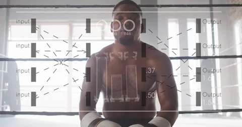 Male boxer resting after round wiping sweat adjusting gloves overlaying sports Stock Footage 331380357