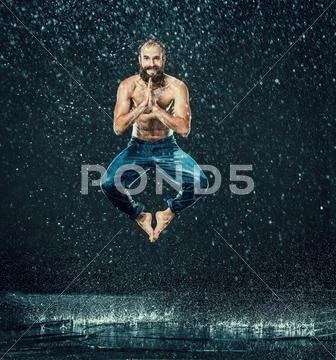 The male break dancer in water Stock Photos