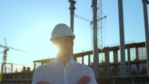 Male builder engineer man worker builder architect in hard hat with tablet Stock Footage 157665496