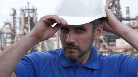 Male builder engineer man worker in hard hat working outside metallurgical plant Stock Footage 163352047