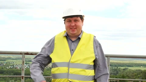 Male builder foreman, engineer, worker or architect on construction building Stock-Footage 111880543