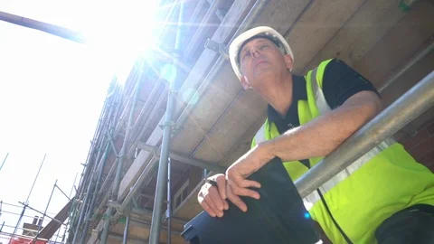 Male builder foreman worker on construction site Stock Footage 106978619
