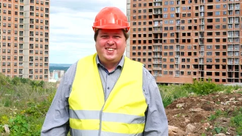 Male builder foreman, worker or architect on construction building site standing Stock Footage 111861647