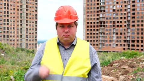 Male builder foreman, worker or architect on construction building site is Stock-Footage 111871101