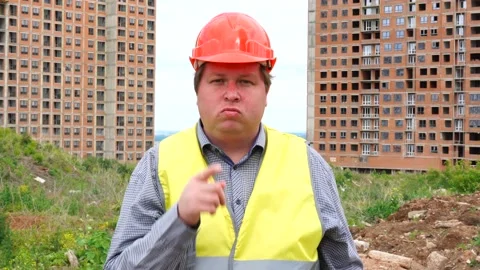 Male builder foreman, worker or architect on construction building site does not Stock Footage 111874145