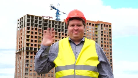 Male builder foreman, worker or architect on construction building site greeting Stock Footage 111877531