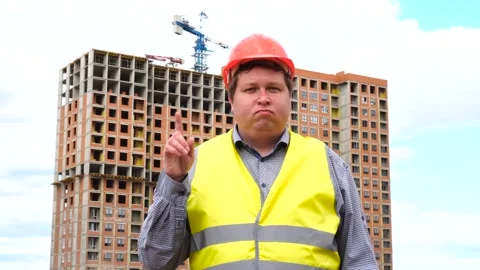 Male builder foreman, worker or architect on construction building site does not Stock Footage 111877970