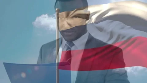 Male business host holding blue folder reading, flag waving revealing face, Stock Footage 330621853