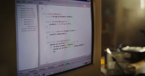 Male Caucasian Programmer Using Computer In Retro Garage Stock Footage 255999503
