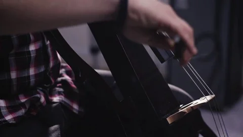 Male cello player Stock Footage 84972529