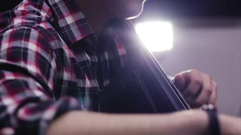 Male cello player Stock Footage 84972609