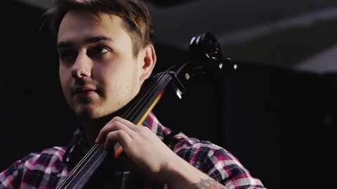 Male cello player Stock Footage 84972775