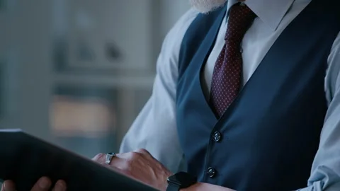 Male CEO Proofreading Documents in Clipboard in Office Video stock 304314007