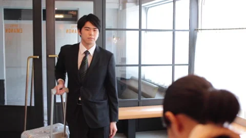 Male checking in to the hotel Stock Footage 161853611