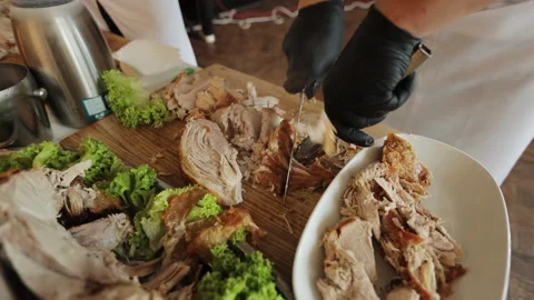 Male chef prepares meat with crispy crust and spices baked on grill in kitchen Video stock 196004723