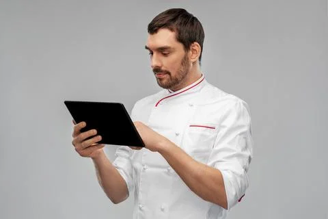 Male chef with tablet pc computer Stock Photos