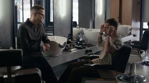 Male Client Explaining His Preferences of Haircut Stock Footage 330419919