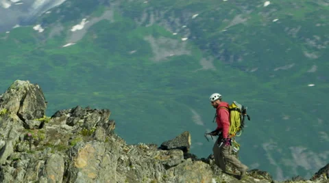 Male Climber Aerial Alaska Mountain Peak Extreme Sport Achievement 4K RED EPIC Stock Footage