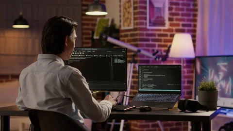 Male coder programming server encryption on firewall software Stock Footage 196802129