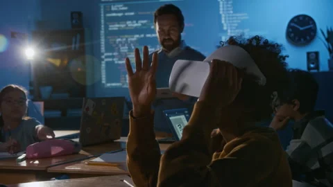 Male Coding Teacher Explaining Algorithm to Schoolkids in Blue Projector Light 스톡 동영상 307269770