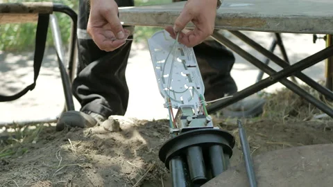 Male communication engineers working with optical cable Stock Footage 112244989