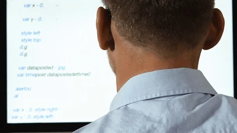 Male computer programmer Stock Footage 78757005