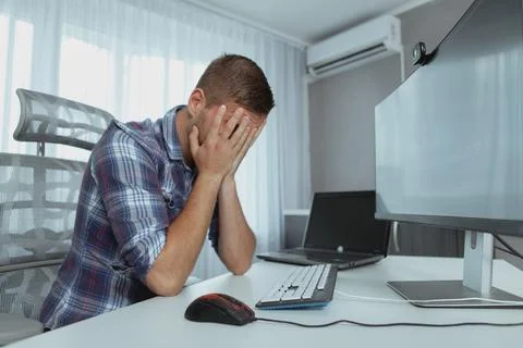 Male computer programmer working from home Stock Photos