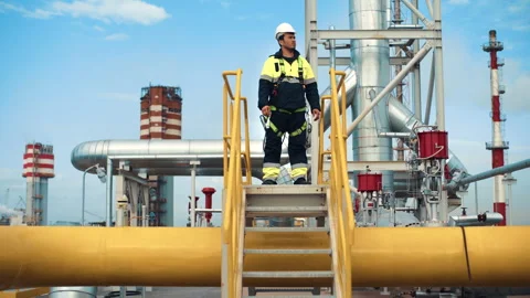 Male contractor industrial engineer checking oil gas fuel factory production Stock Footage 252715788