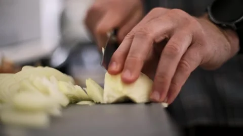 Male Cook Cutting Onion With Sharp Knife Stock Footage 339025057