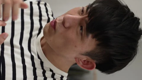 Male is cursing while grabbing his hair Stock Footage 228895118