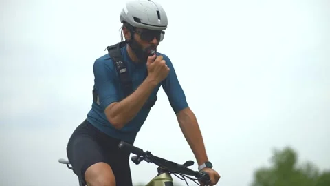Male cyclist riding his mountain bike outdoors Stock Footage 313951453