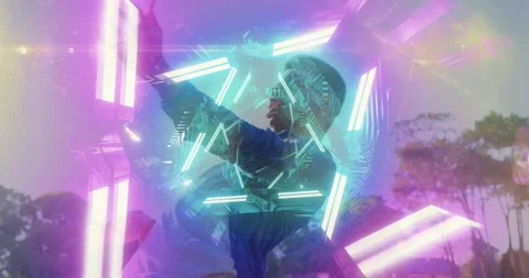 Male dancer adjusting jacket outdoors neon bars around torso and forming Stock Footage 330142959