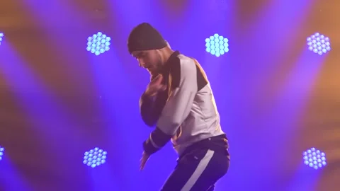 Male dancer dancing break dance, hip hop, street dancing in the studio, isolated Stock Footage 138917682