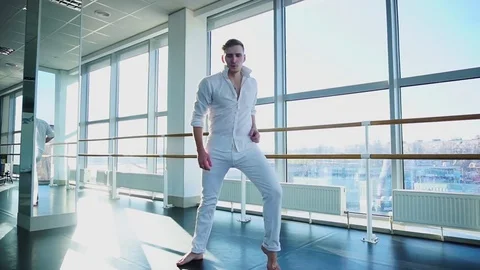 Male dancer moves using street style elements. Stock Footage 84571579