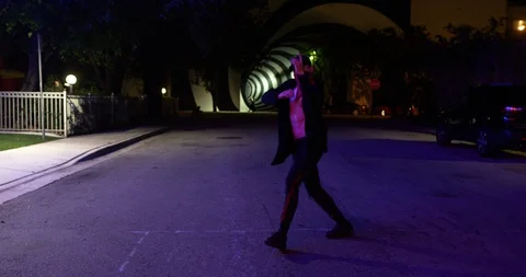 Male dancer performing his routine under an overpass at night Stock Footage 100182654