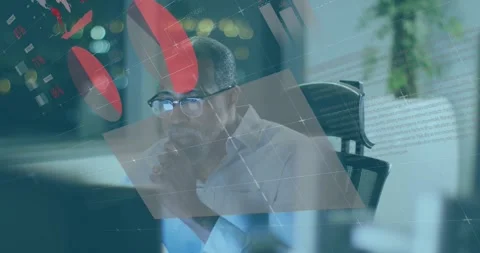 Male data analyst tapping lips causing red charts animating on window pane for Stock Footage 325837212