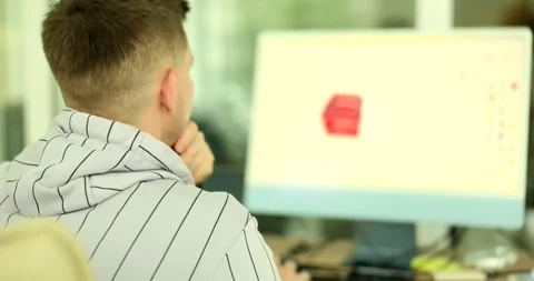 Male designer creates 3D model of product on computer Stock Footage 249054380
