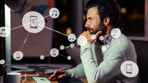 Male designer typing and using stylus, activating network nodes expanding over Stock Footage 333154242