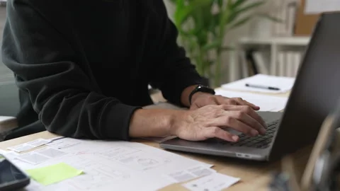 A male designer working on website prototype Stock Footage 340903046