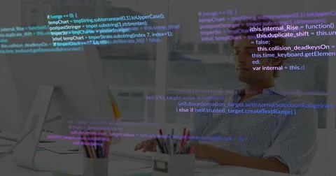 Male dev typing at desk while code overlay appearing, scrolling, obscuring Foto stock